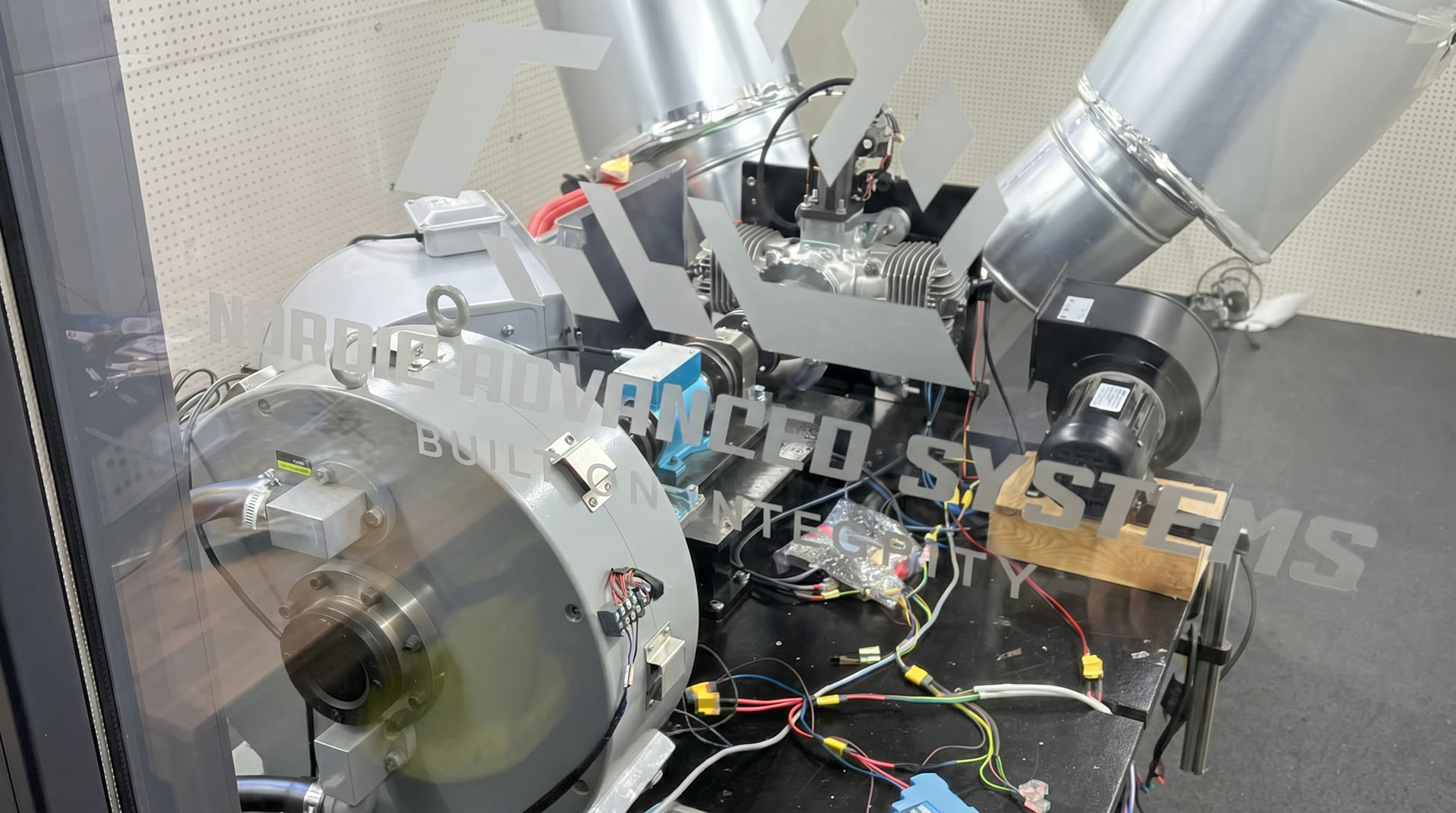 NAS engine on test rig with dynamometer and exhaust ducting